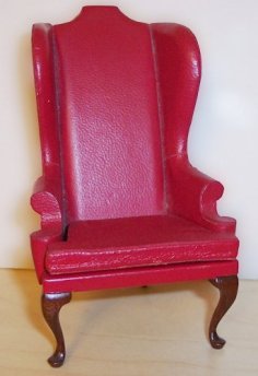 Red leather wing chair